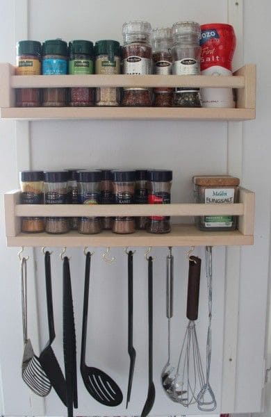 ikea spice rack along with cooking spoons