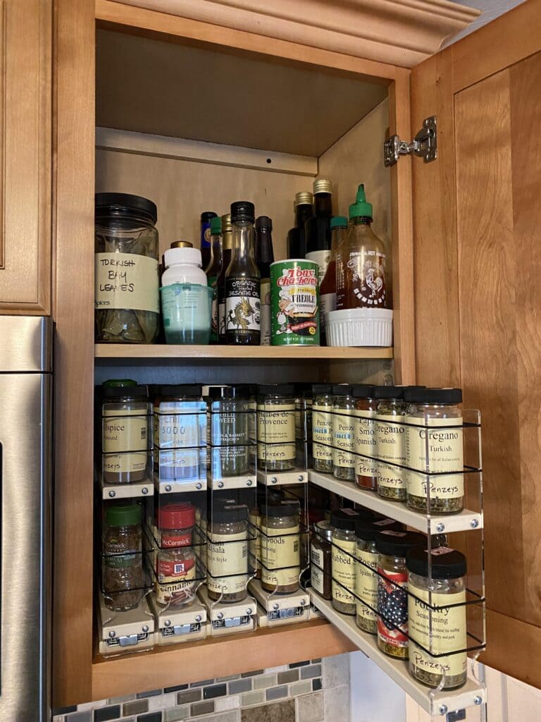 sliding spice cabinet along with different types of spices