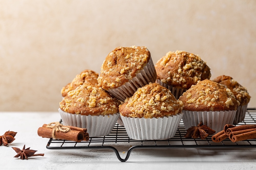 Cinnamon Streusel Muffins Or Mini Cakes Homemade Bakery Beige Background