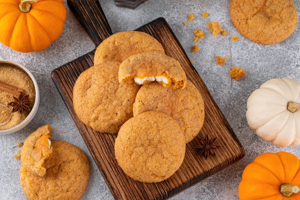 Pumpkin cinnamon cookies with cream cheese filling.