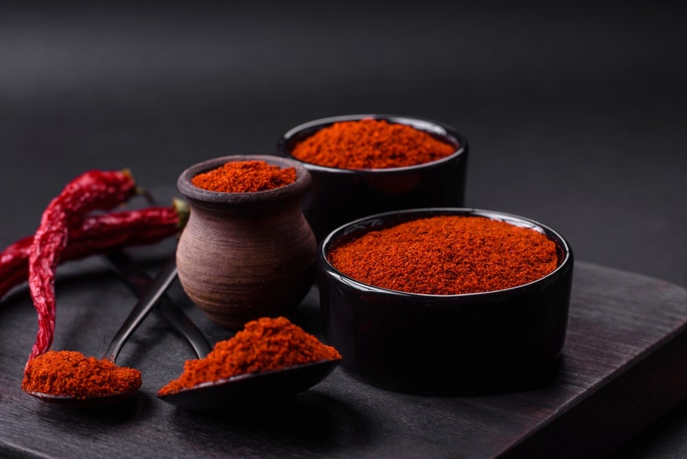 Spice Smoked Paprika In The Form Of Powder In Bowls