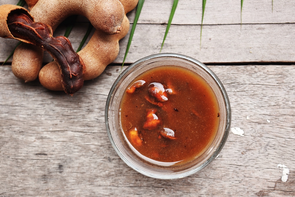 Tamarind Sauce On Wood Background