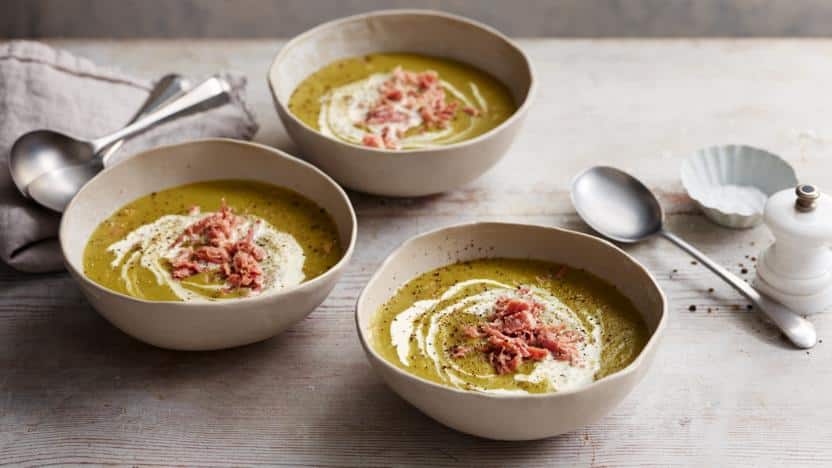 three bowls of soup prepared using mace spice