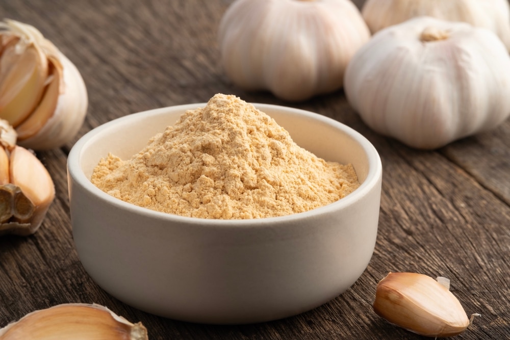 Food Additive Garlic Powder In White Bowl Natural Food Ingredient