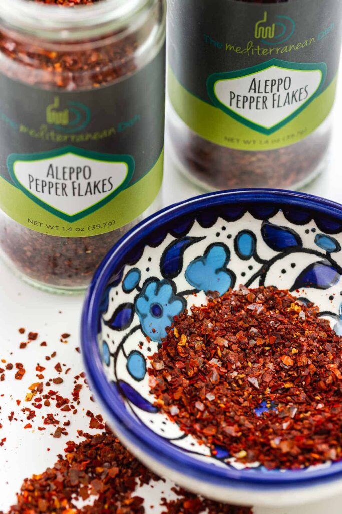 aleppo pepper in a blue and white bowl