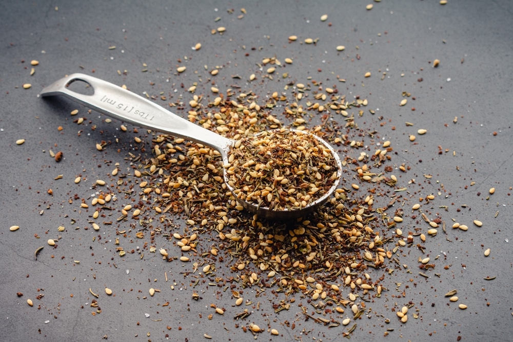 Za'atar Spice Blend In A Tablespoon: A Traditional Middle Eastern spice in a measuring spoon 