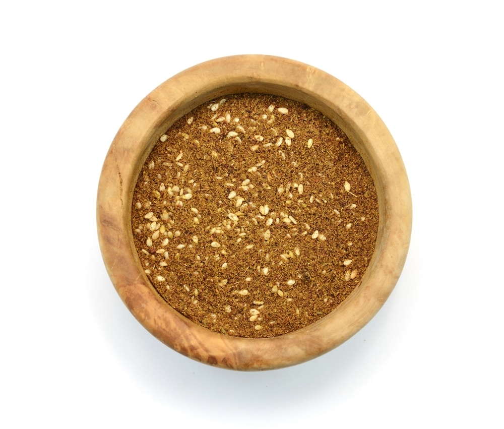 Zaatar Spice In A Wooden Bowl Isolated On White Background